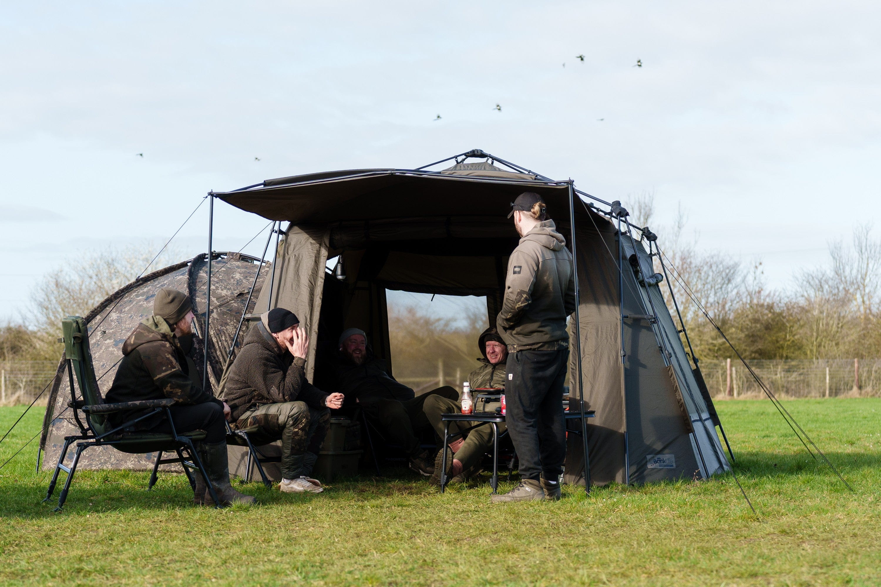 camping tent, outdoor shelter, camping group, camp chairs, mud/dirt camo