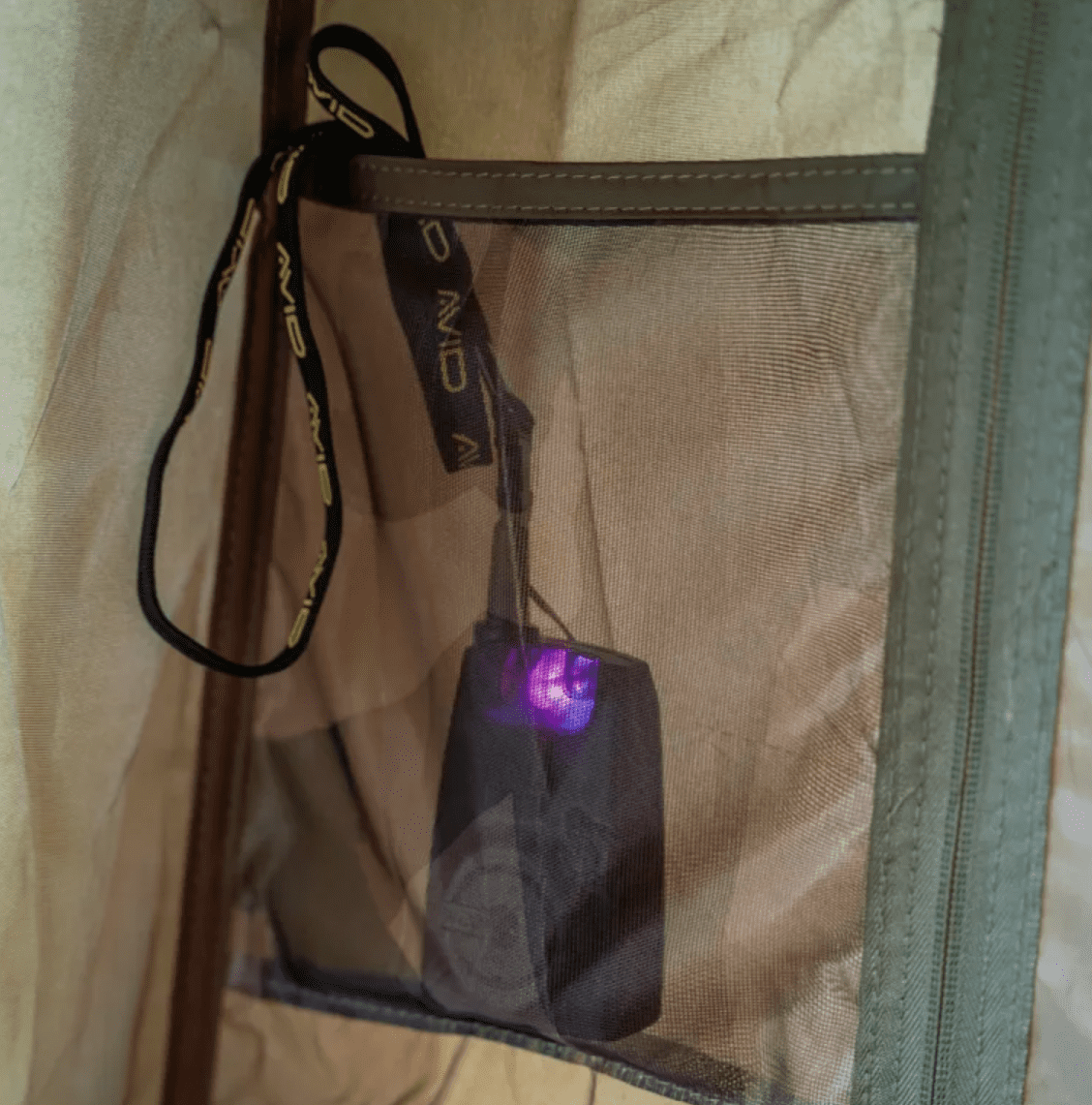 glühendes Gerät, Netztasche, USB betrieben, orange-braun, braune Reißverschluss